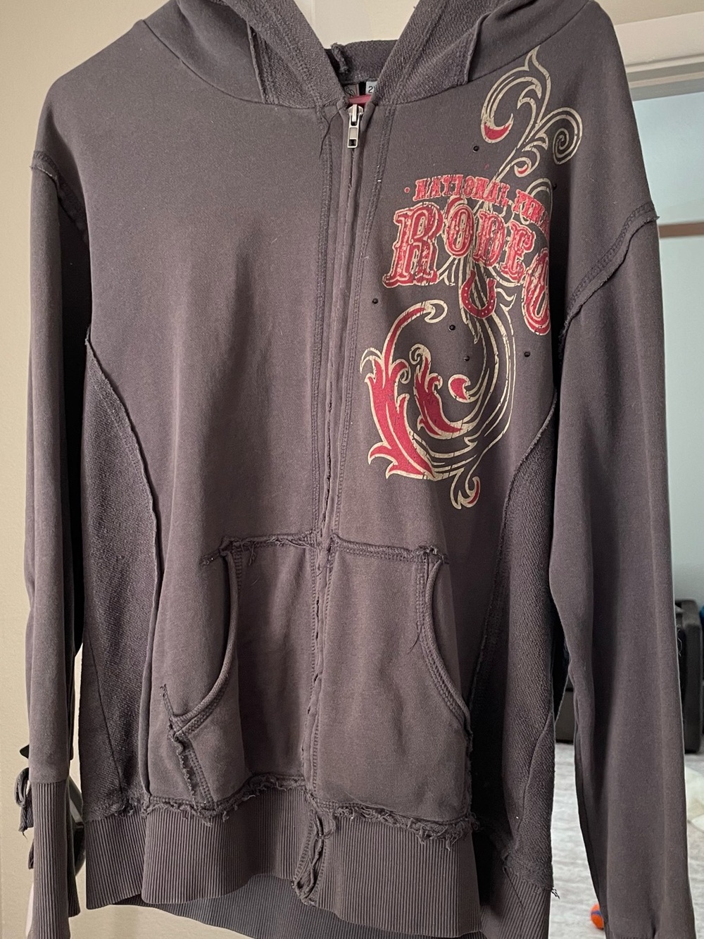 PRCA National Finals Rodeo Women’s Grey Zip-Up Hoodie with Red Graphic Accent
